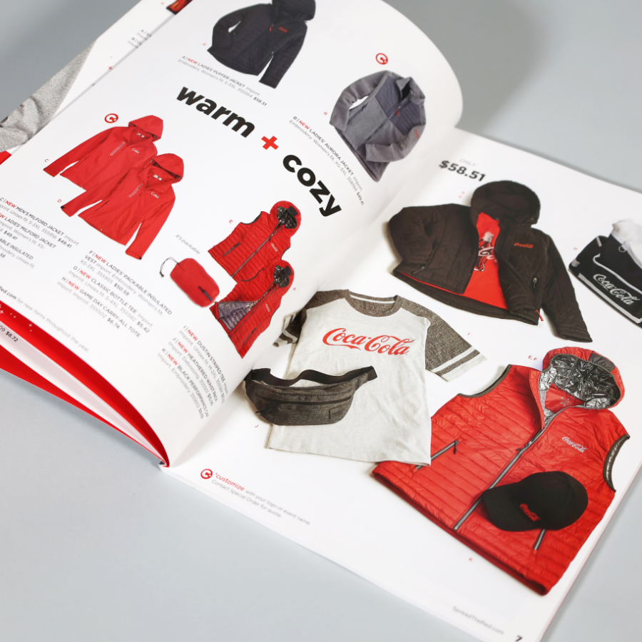 inside spread of Staples Coca-Cola Catalog with visuals of winter apparel