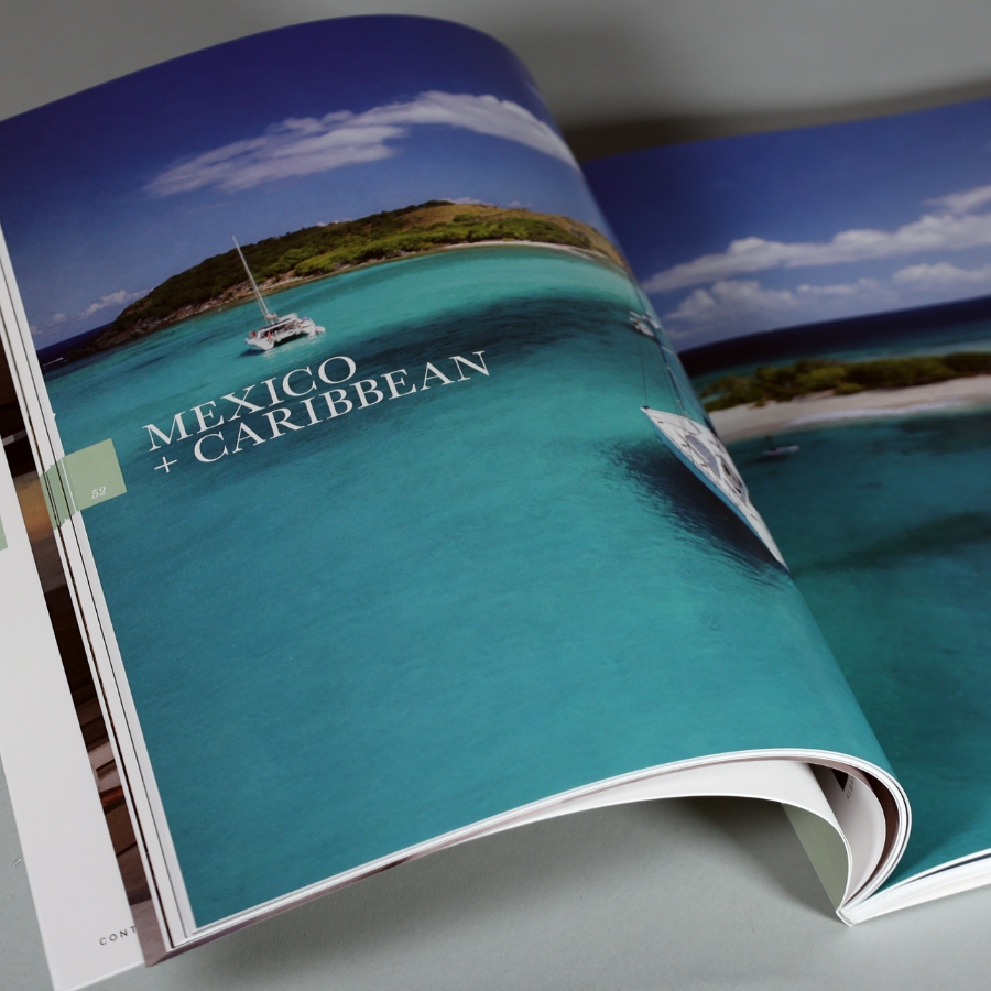 inside spread of travel brochure showing relaxing blue water